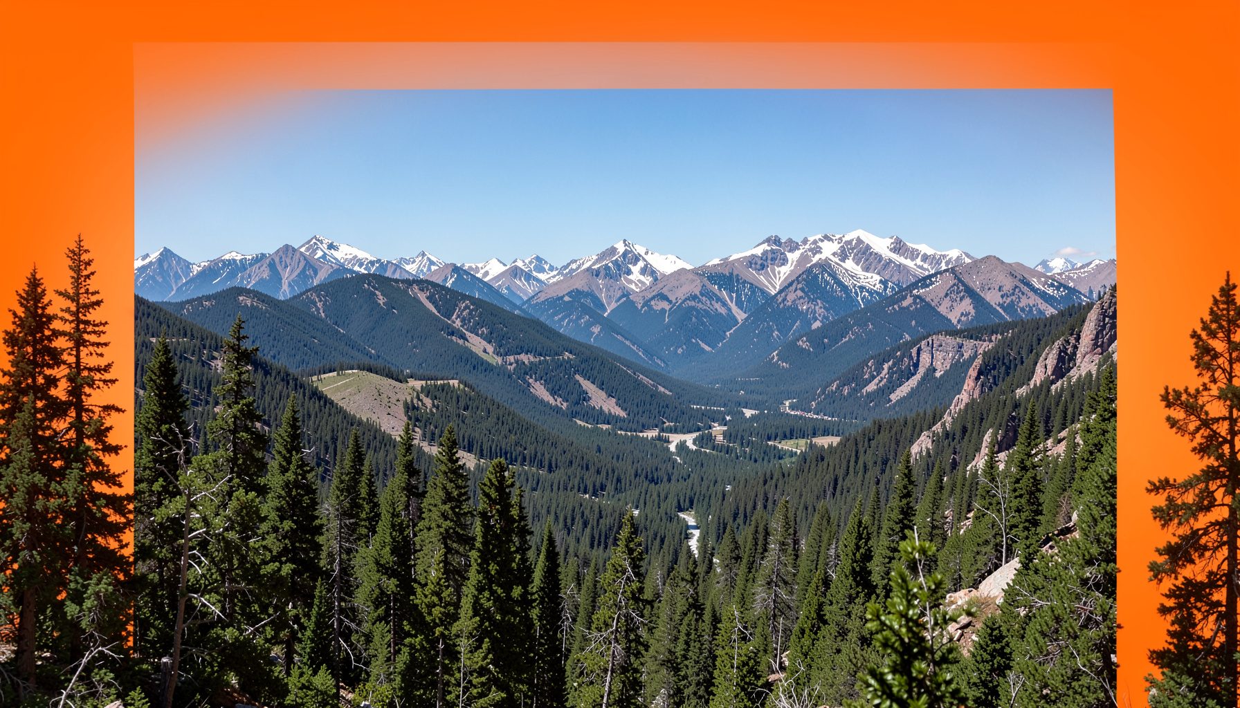 A wide landscape photograph of a historic Colorado mountain valley with pine forests and distant snow-capped peaks under a clear blue sky, conveying the rugged natural beauty of the Nederland area.